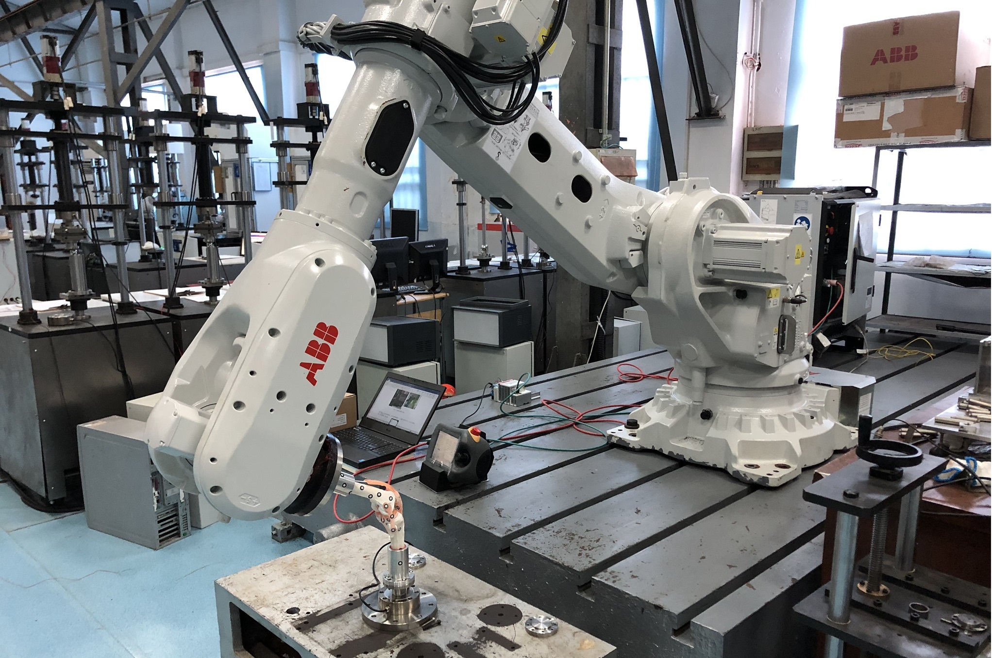 a knee joint controlled by ABB IRB6700 robotic arm